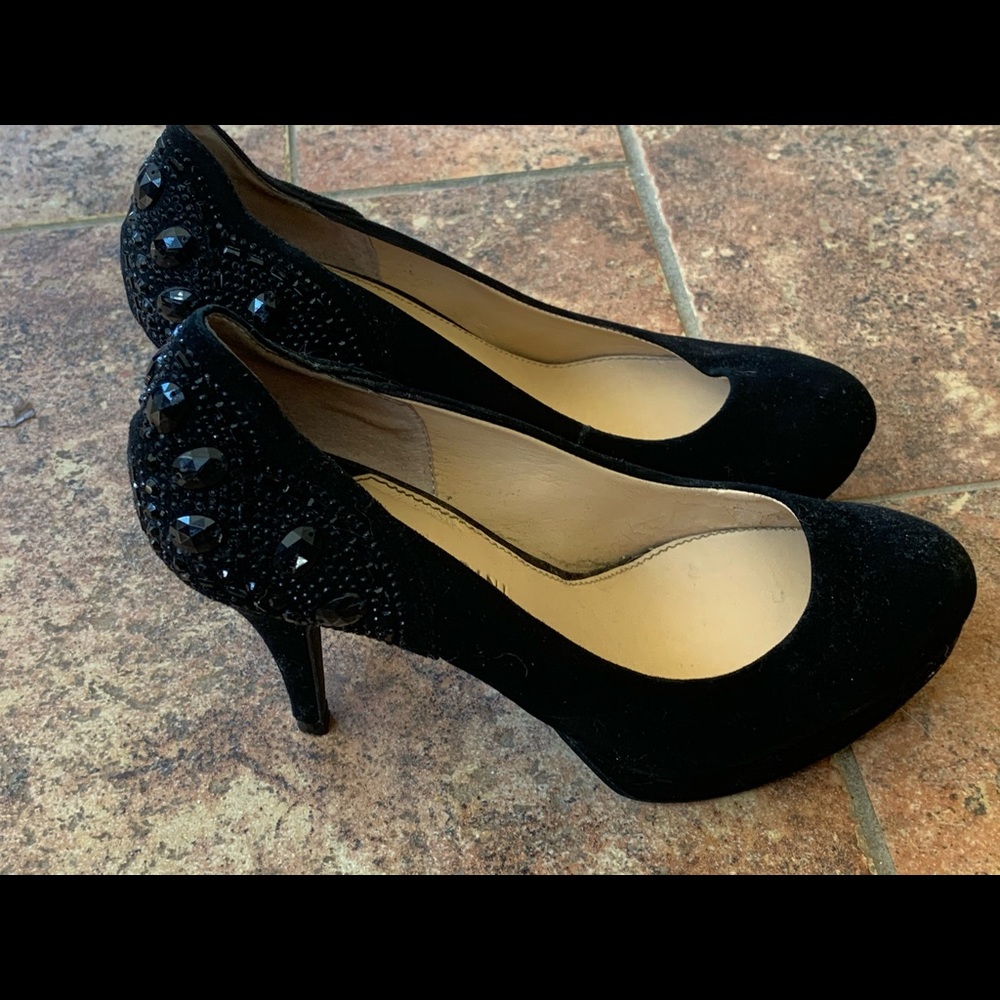 Black bedazzled four inch pumps